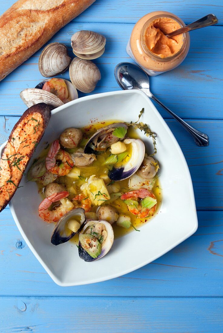 Seafood soup with shrimps, clams and potatoes