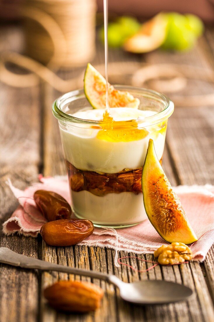 A dessert with old biblical ingredients: yoghurt with dates, figs, nuts and honey