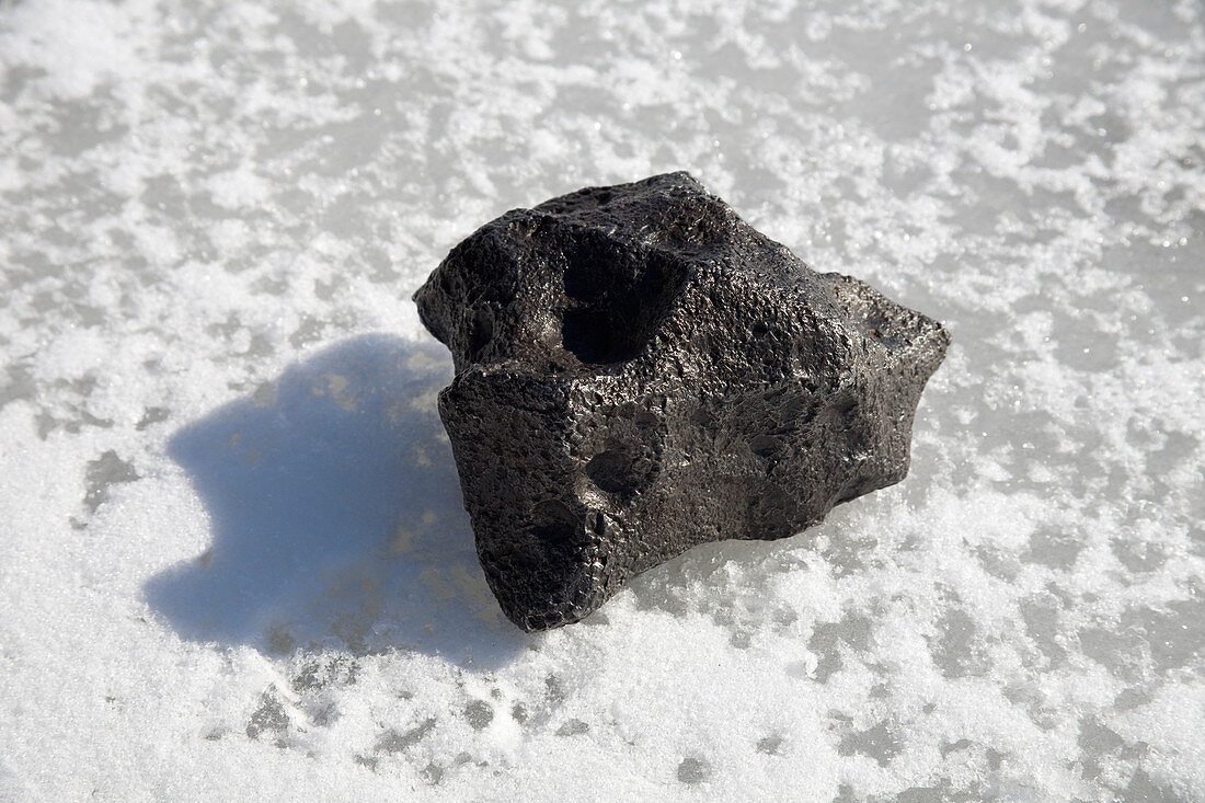 Iron Nickel Meteorite on Ice