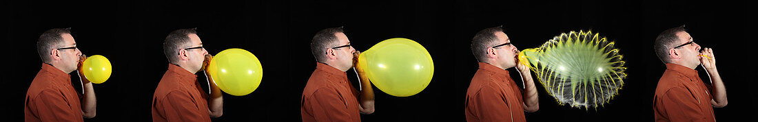 Man bursting a balloon
