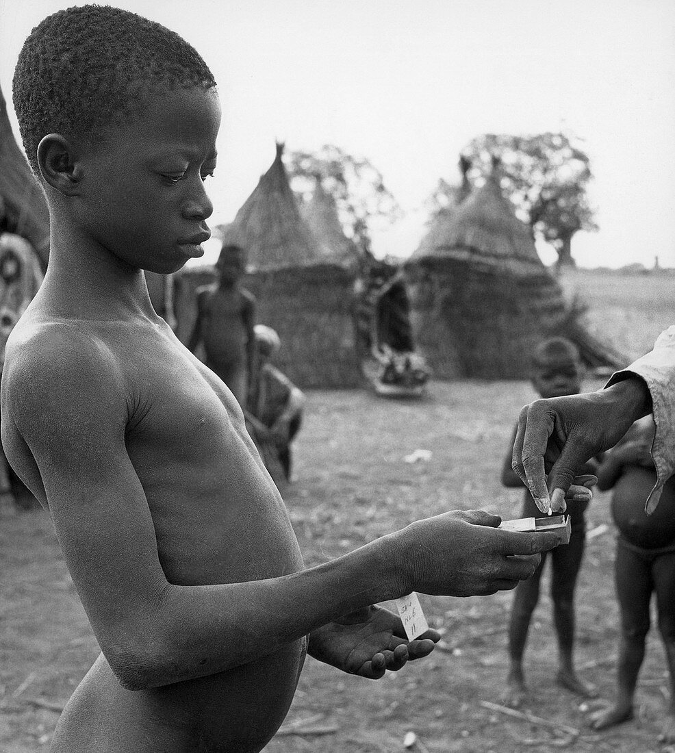 Boy with Leprosy Receiving Medication
