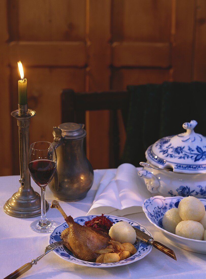 A Table Setting with a Plate of Goose Leg; Dumplings