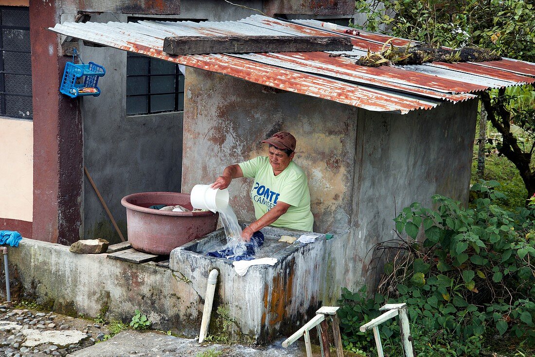 Woman washing clothes,Ecuador