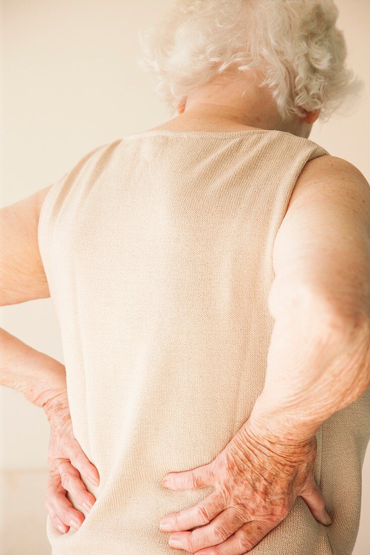 Elderly woman with back pain