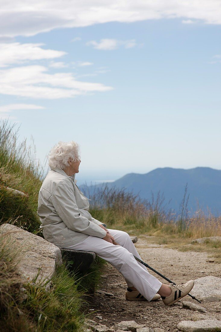 Elderly woman looking away