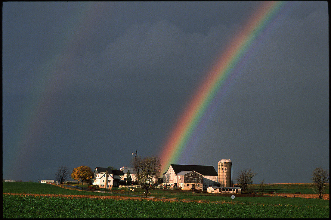 Rainbow over farmstead in Pennsylvania,USA