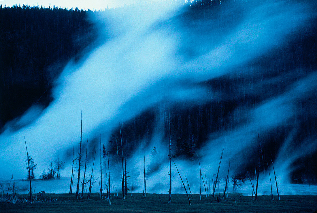 Steam trails rising from geysers