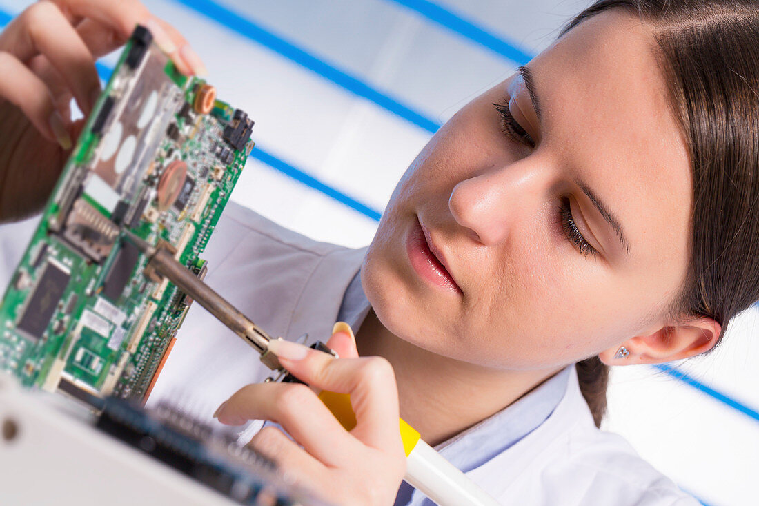 Female electrical engineer with circuit