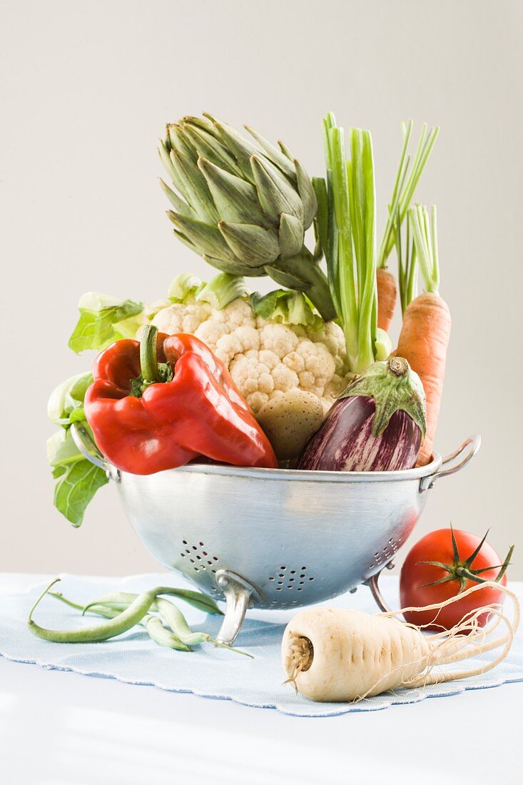 Fresh vegetables in a colander