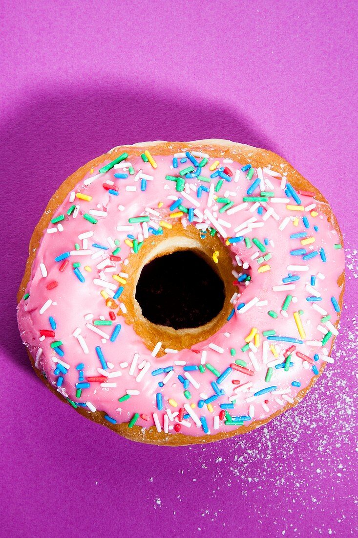 Pink doughnut with sprinkles