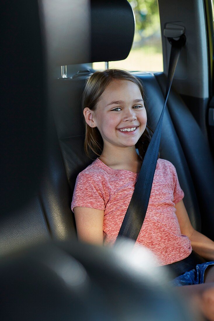 Girl wearing seat belt
