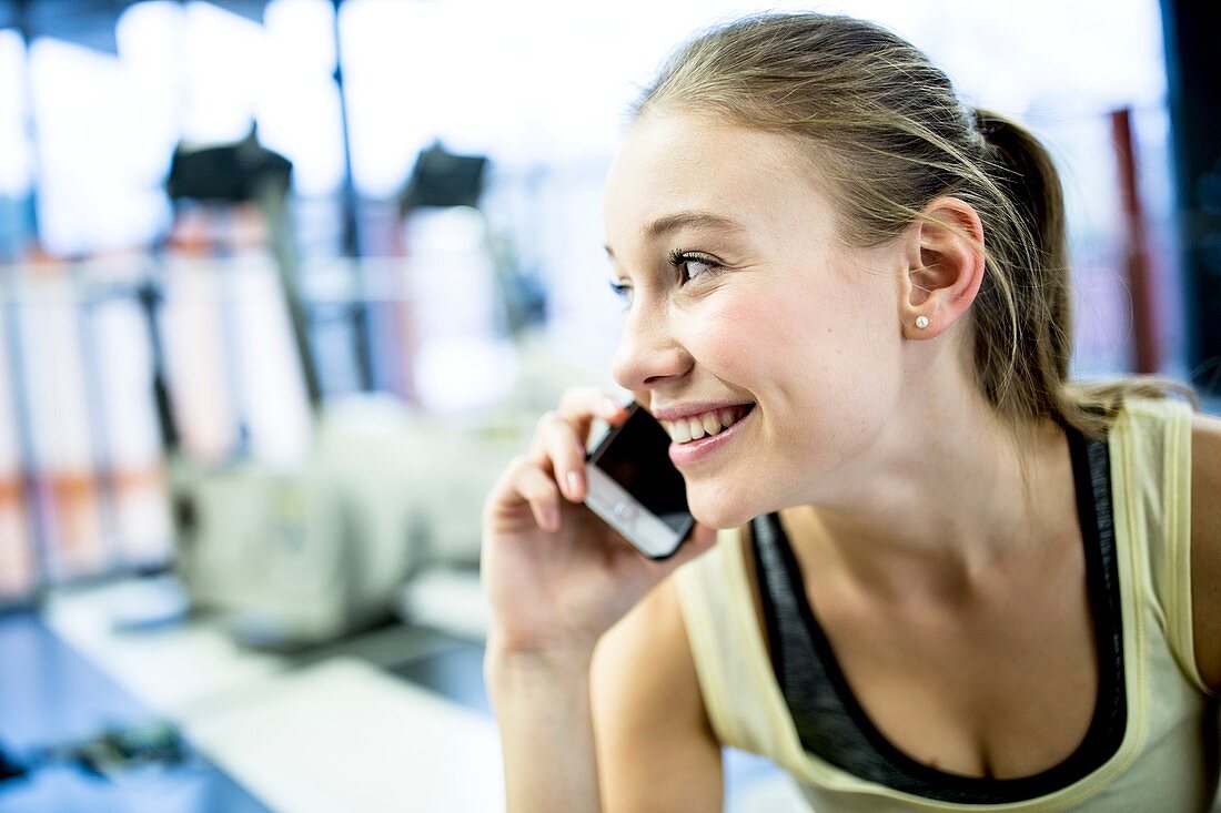 Young woman talking on mobile phone