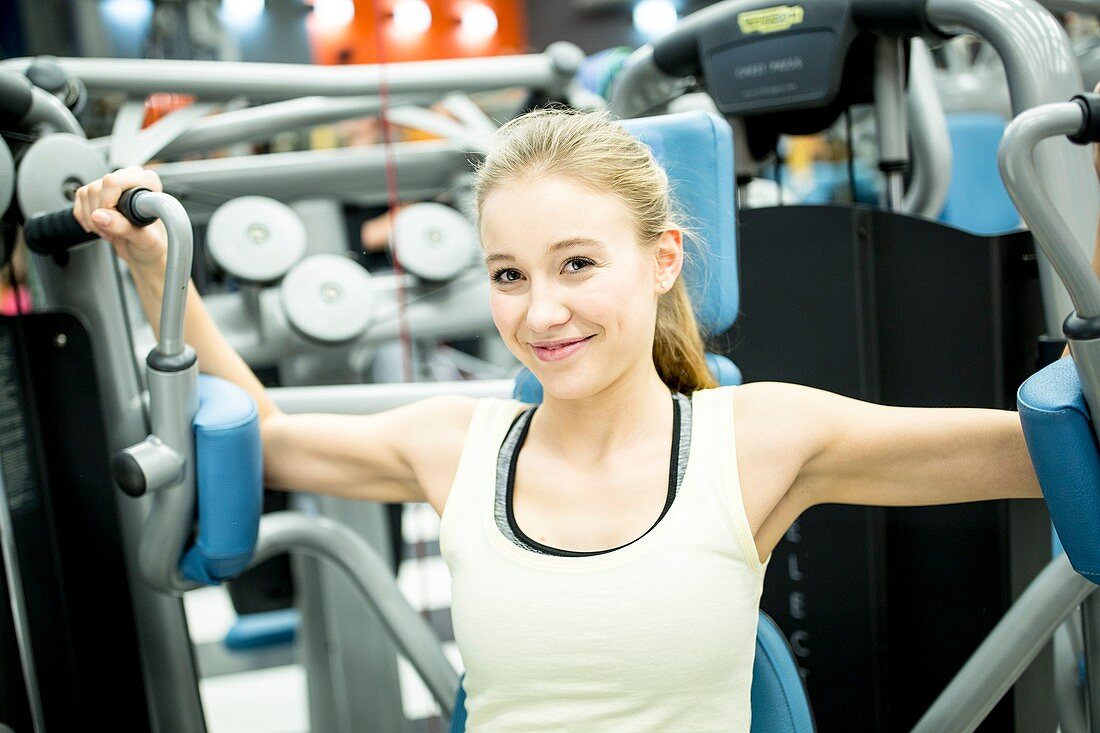 Woman using butterfly machine