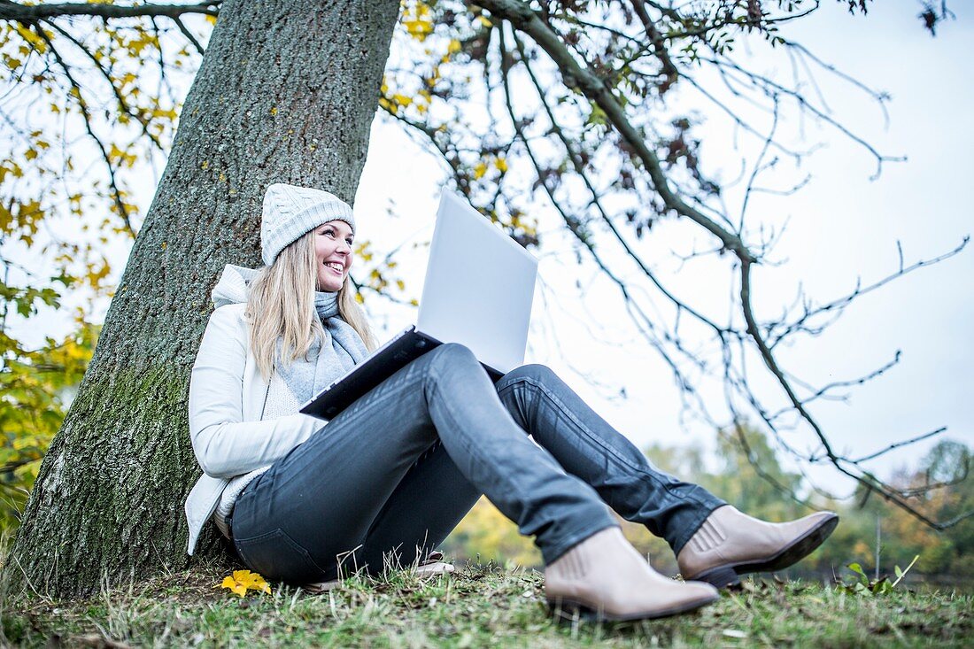 Young woman using laptop