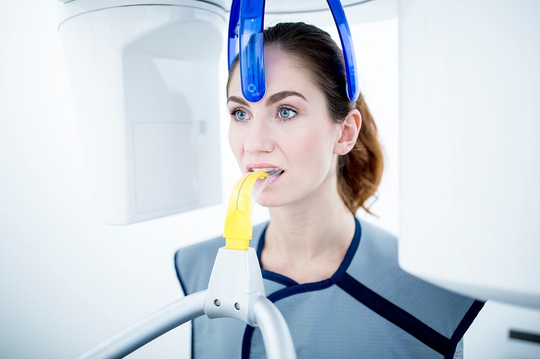 Young woman having dental x-ray