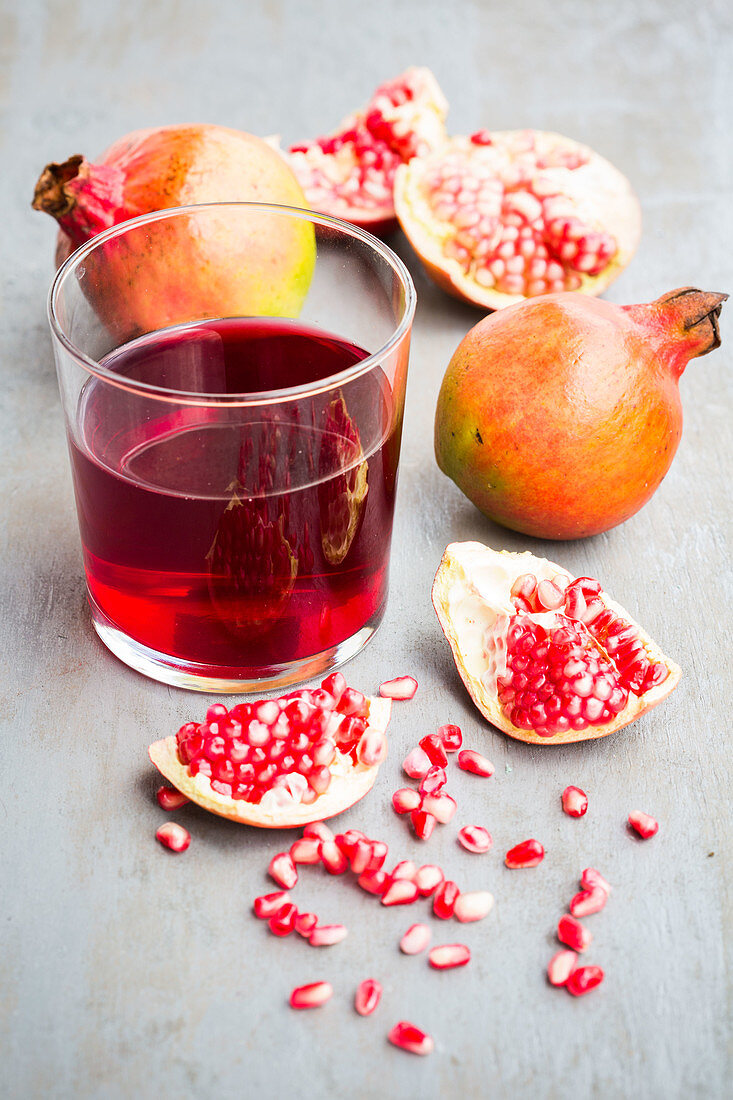 Halved pomegranate juice