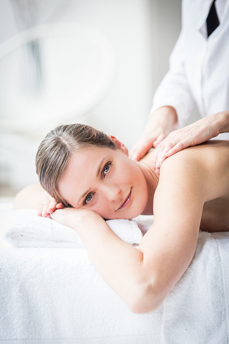 Woman receiving a back massage