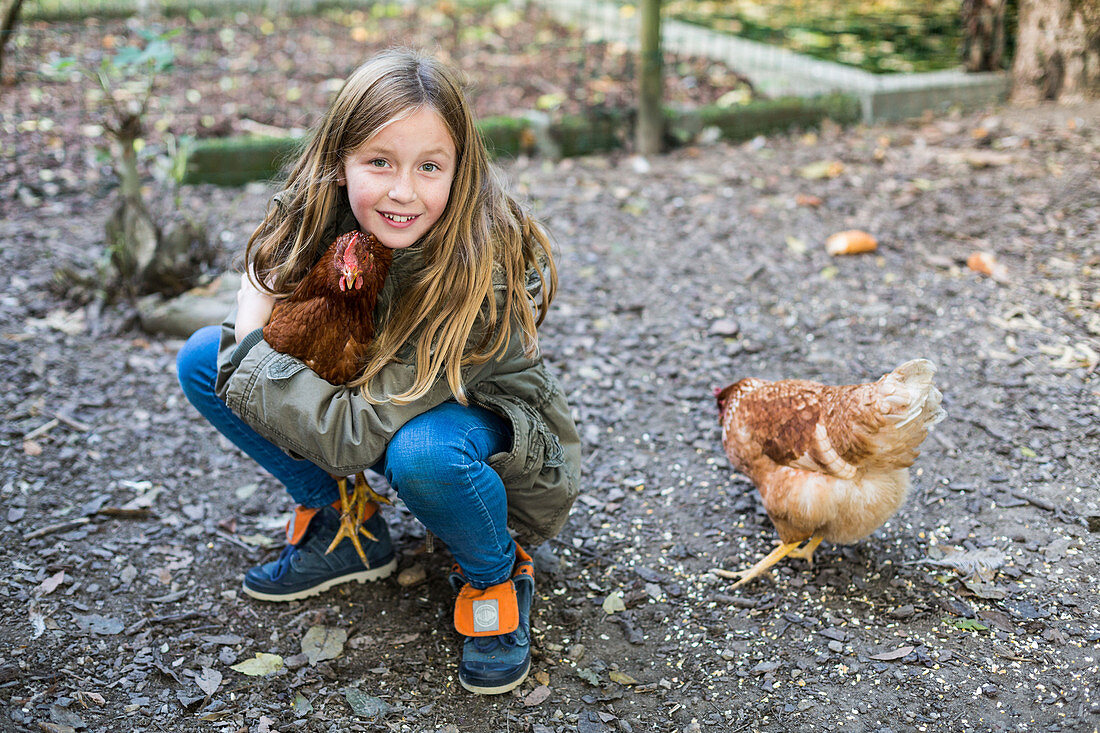 Child with hens