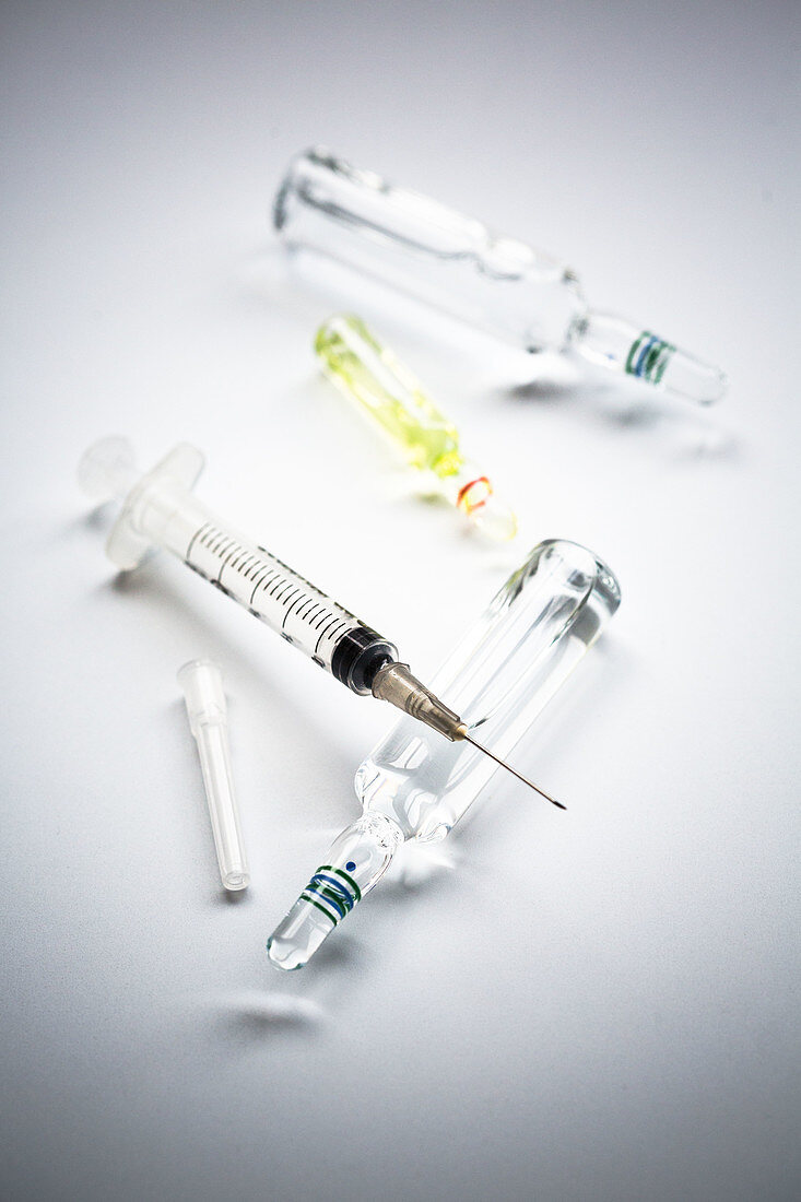 Syringe and phials