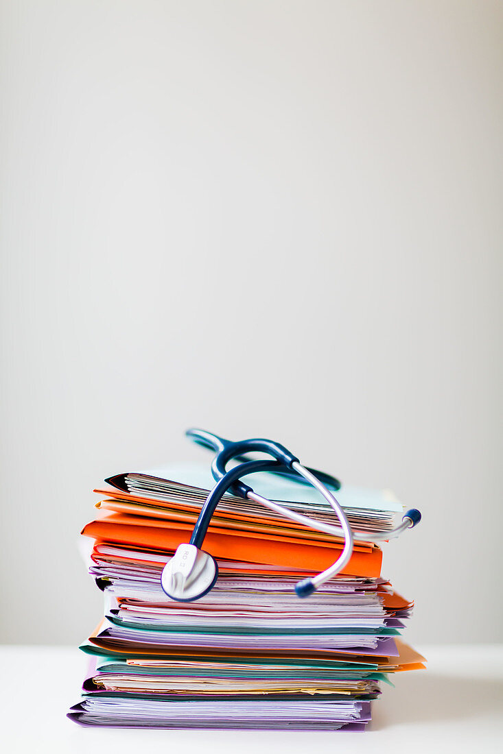 Administrative files and stethoscope