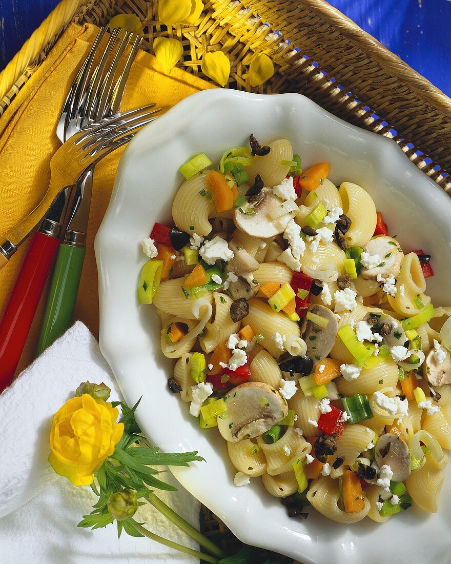 Summer salad: marinated mushrooms, vegetables, sheep's cheese