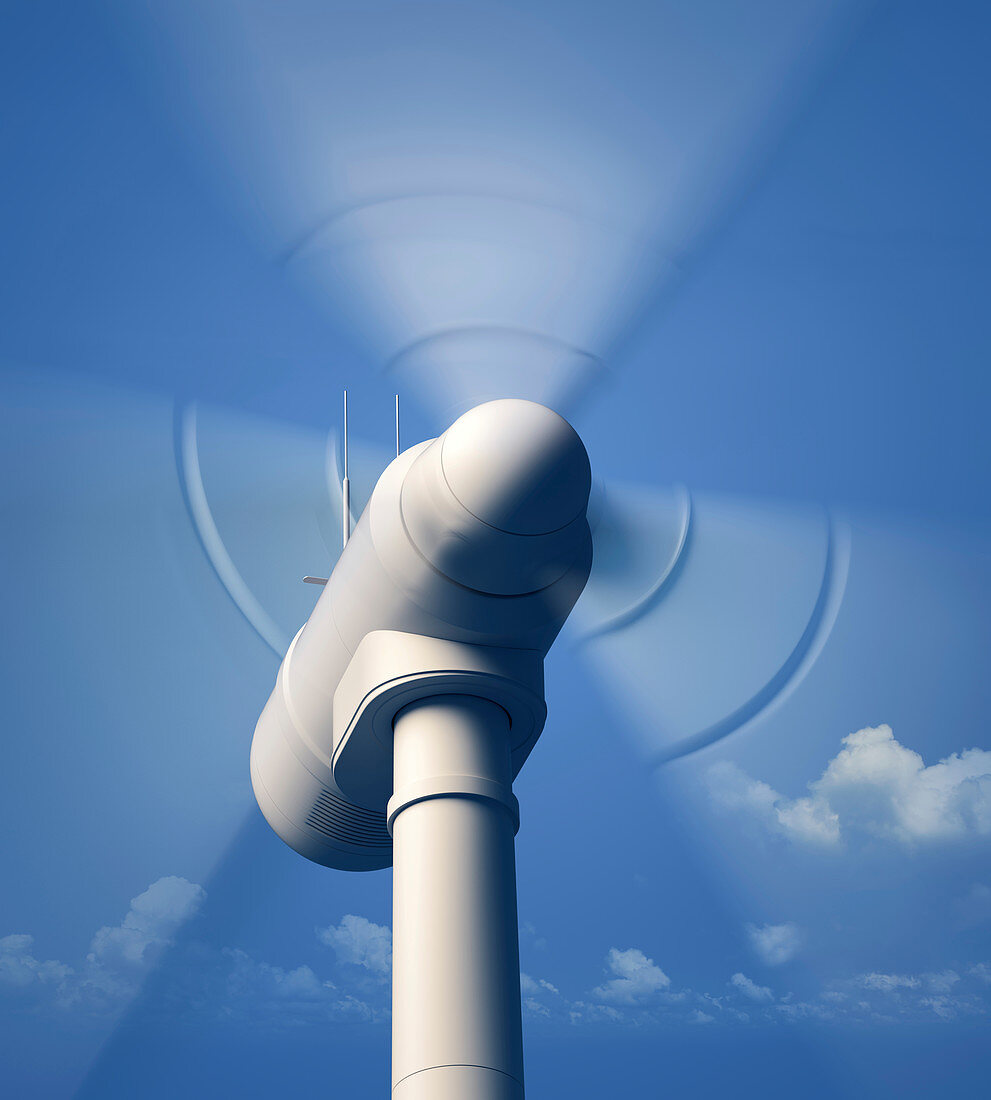 Wind turbine against blue sky