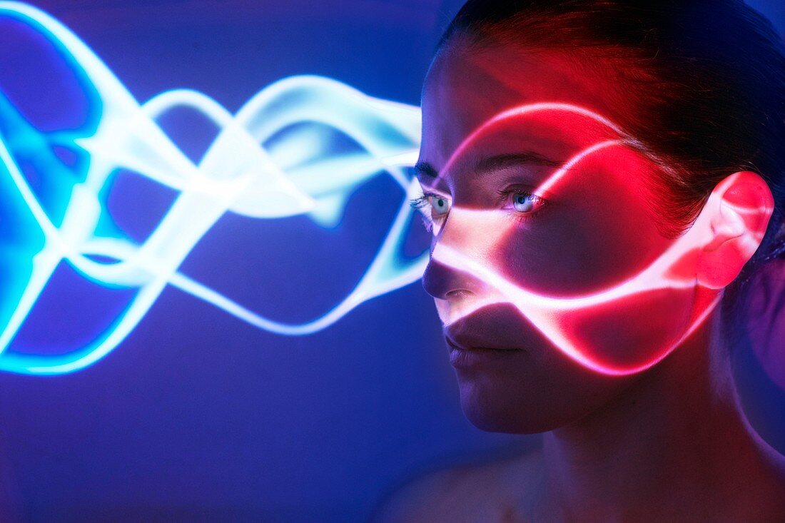 Woman with lights on face