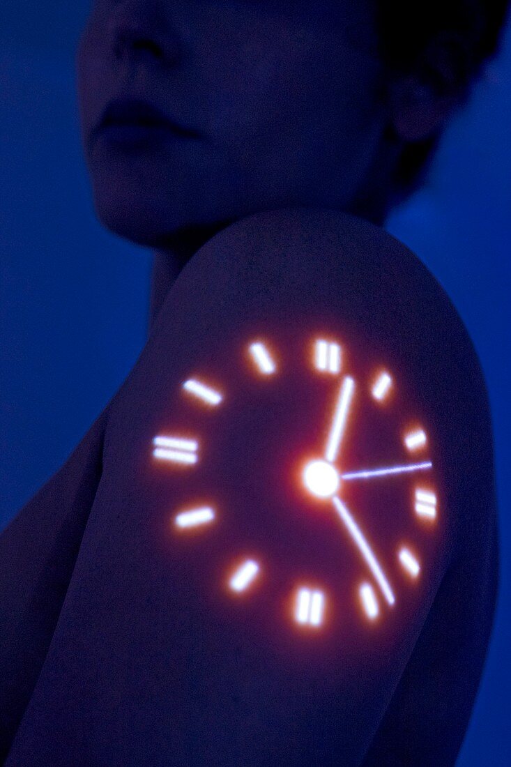 Woman with clock projected on shoulder