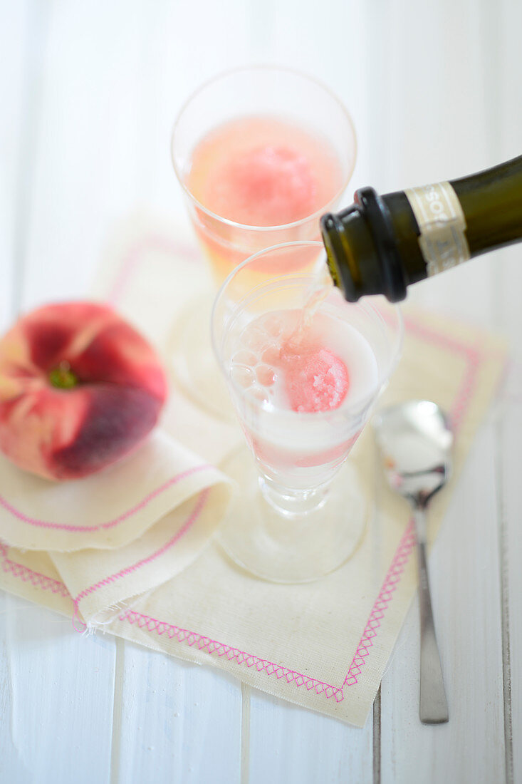 A bellini with peach sorbet