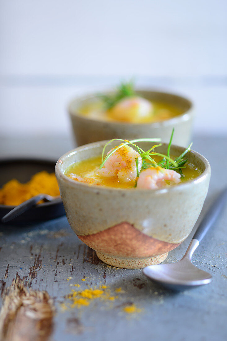 Curry and mango soup with prawns