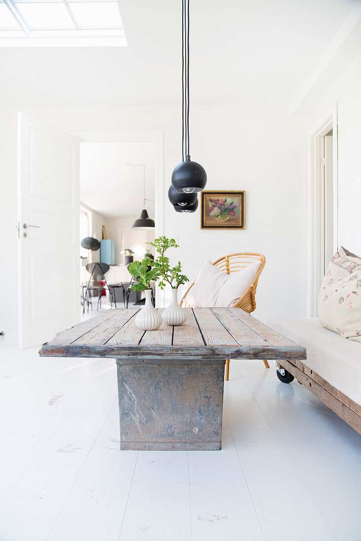 Rustic coffee table and pallet couch on castors