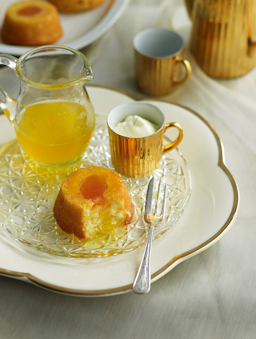 Upside down apricot cakes with orange syrup