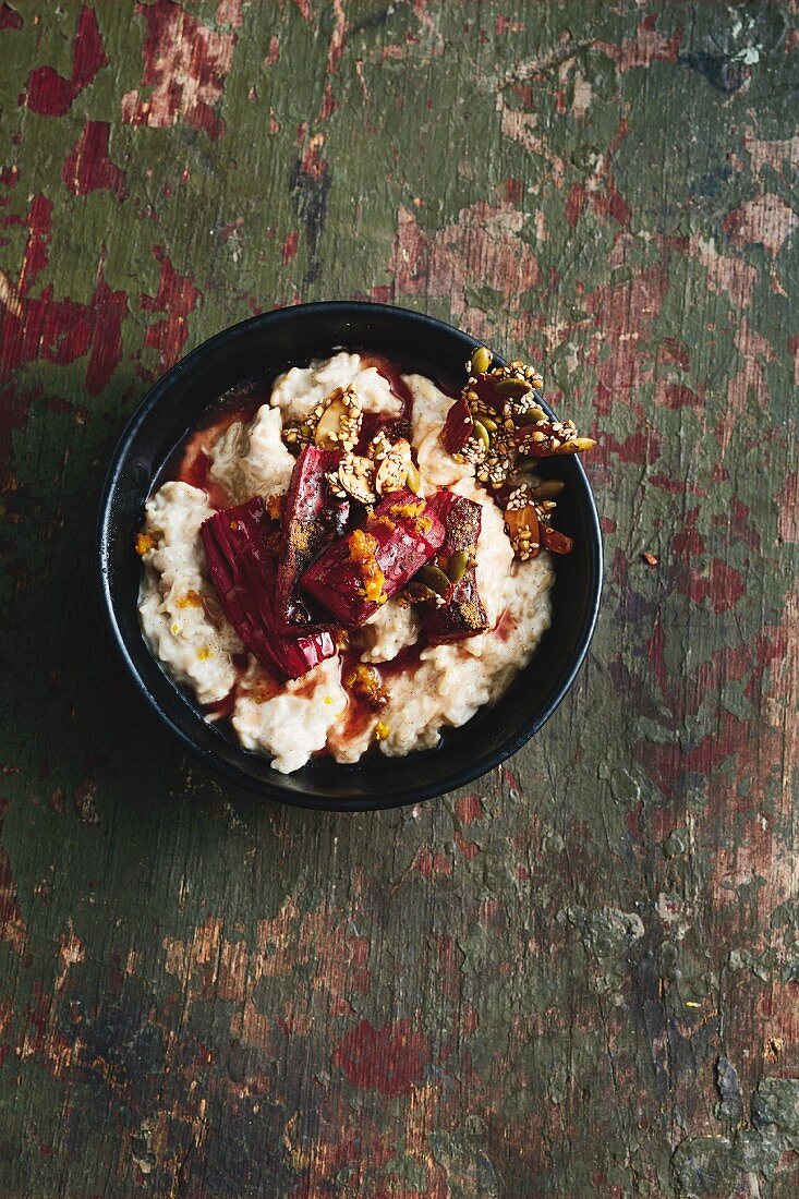 Creamy coconut rice with spiced rhubarb and seed crunch