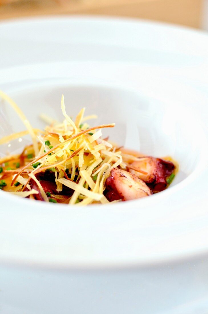 Grilled octopus with potato straw (Spain)