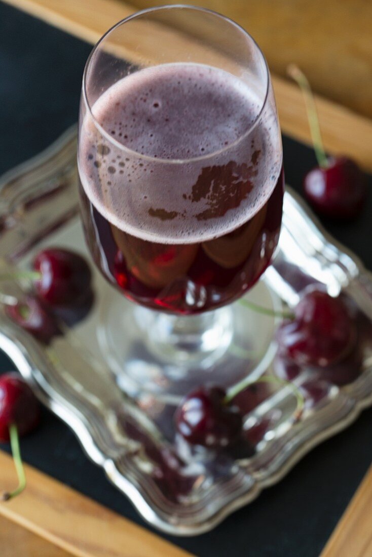 A glass of cherry beer