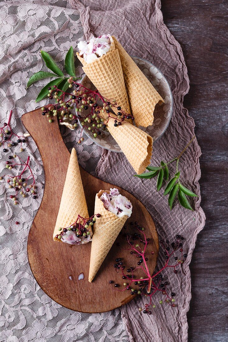 Ice cream cones with elderberry ice cream