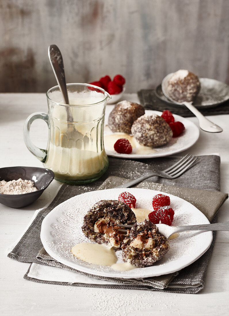 Poppyseed and marzipan dumplings with white mulled wine sabayon