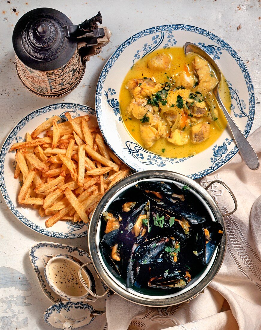 Cod soup, mussels with mustard sauce and chips