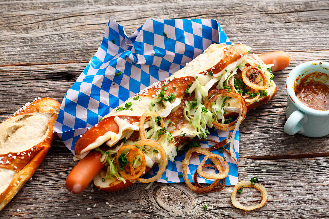 Bavarian hotdog with camembert and white cabbage