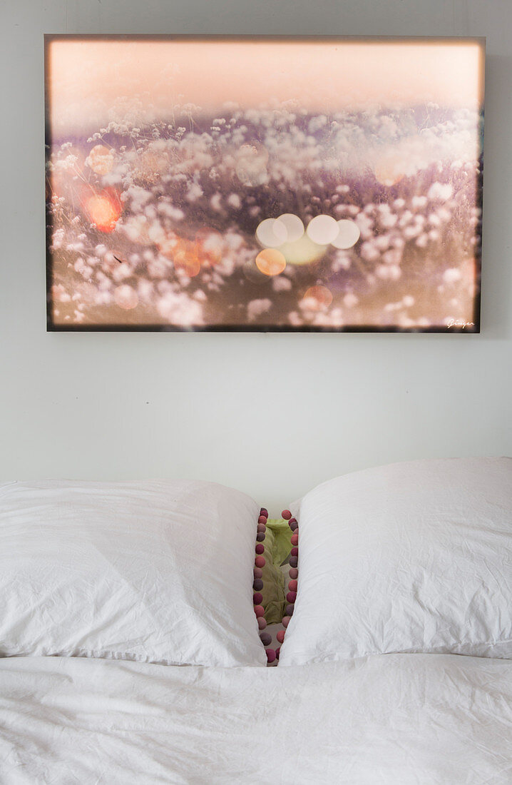 Picture above double bed with white bed linen