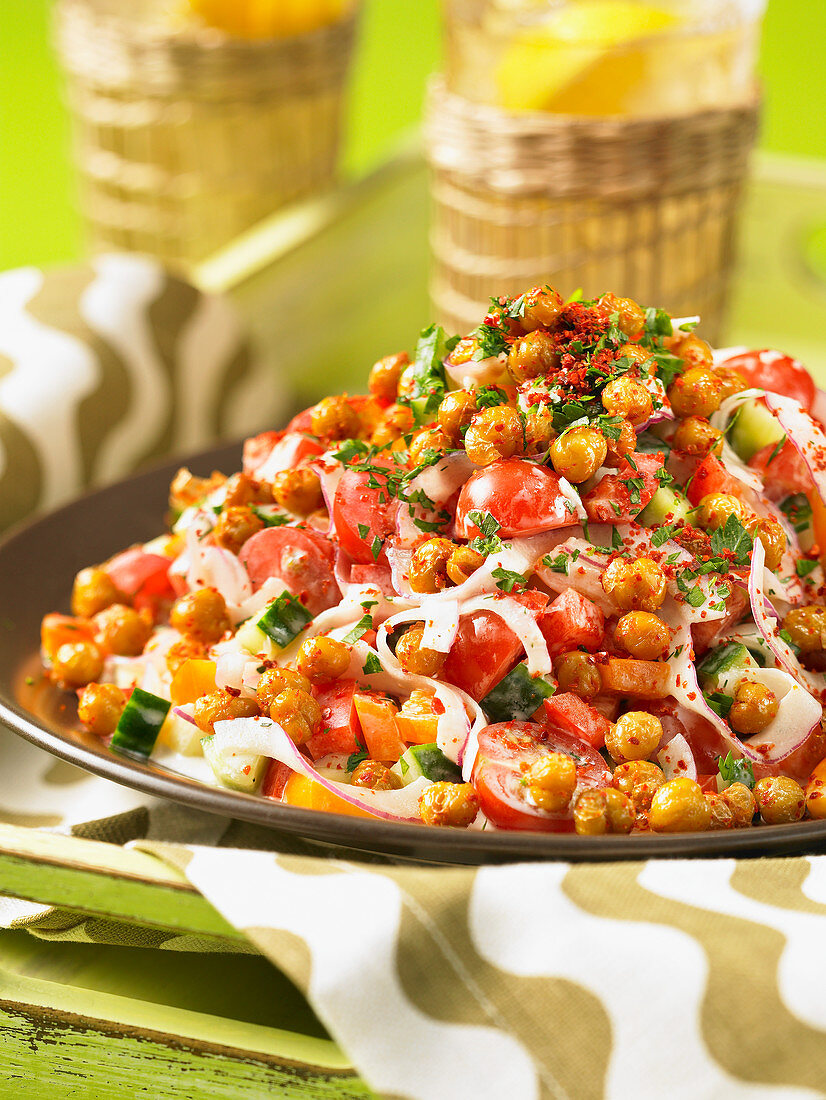 Fried chickpea and tomato salad