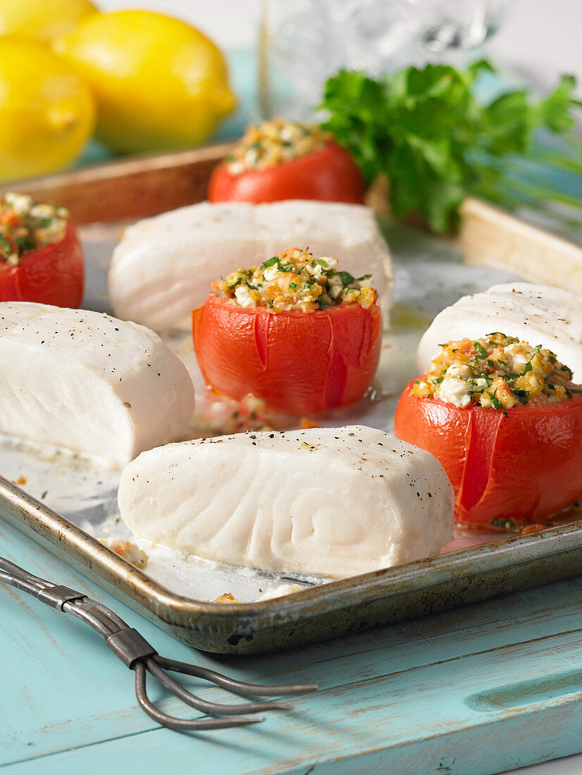 Pan-cooked halibut with stuffed tomatoes