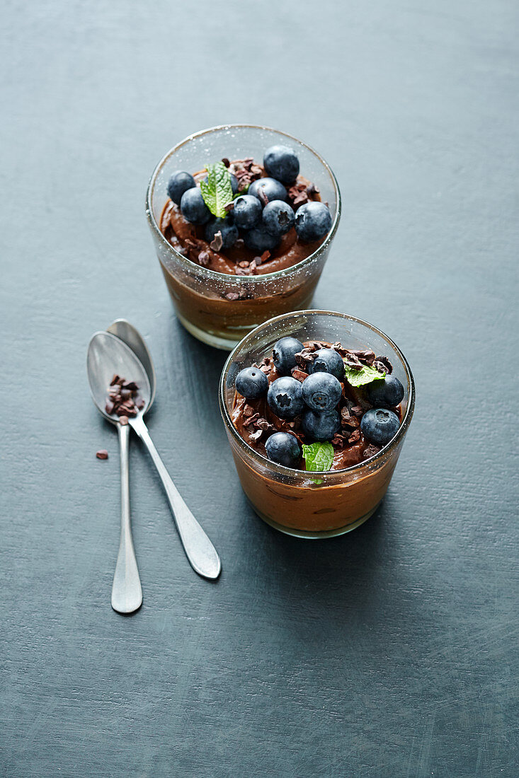 Vegan avocado chocolate mousse with blueberries