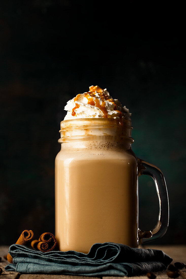 A caramel latte with cream