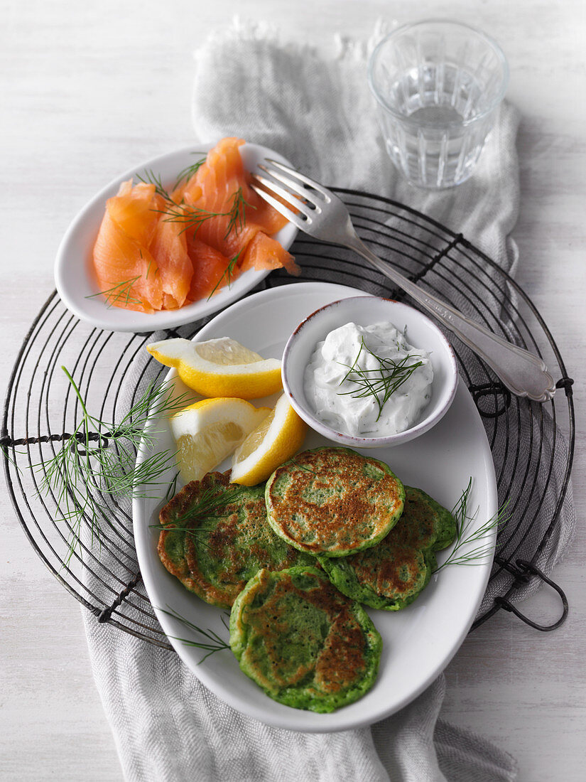 Green spinach pancakes with smoked salmon