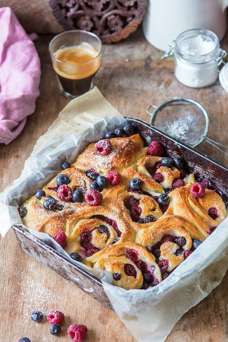 Berry buns dusted with icing sugar