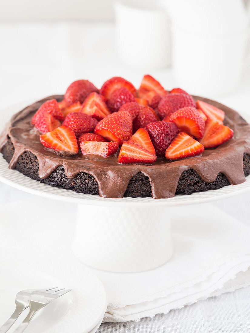 Vegan flourless chocolate tart with poppy seeds and chocolate