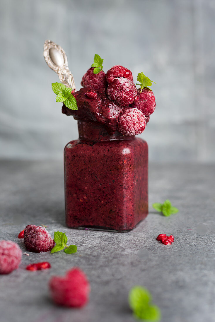 Frozen smoothie sorbet with raspberries, cashew milk and acai