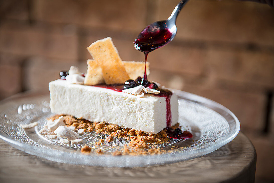 German gingerbread cheesecake with blueberry sauce