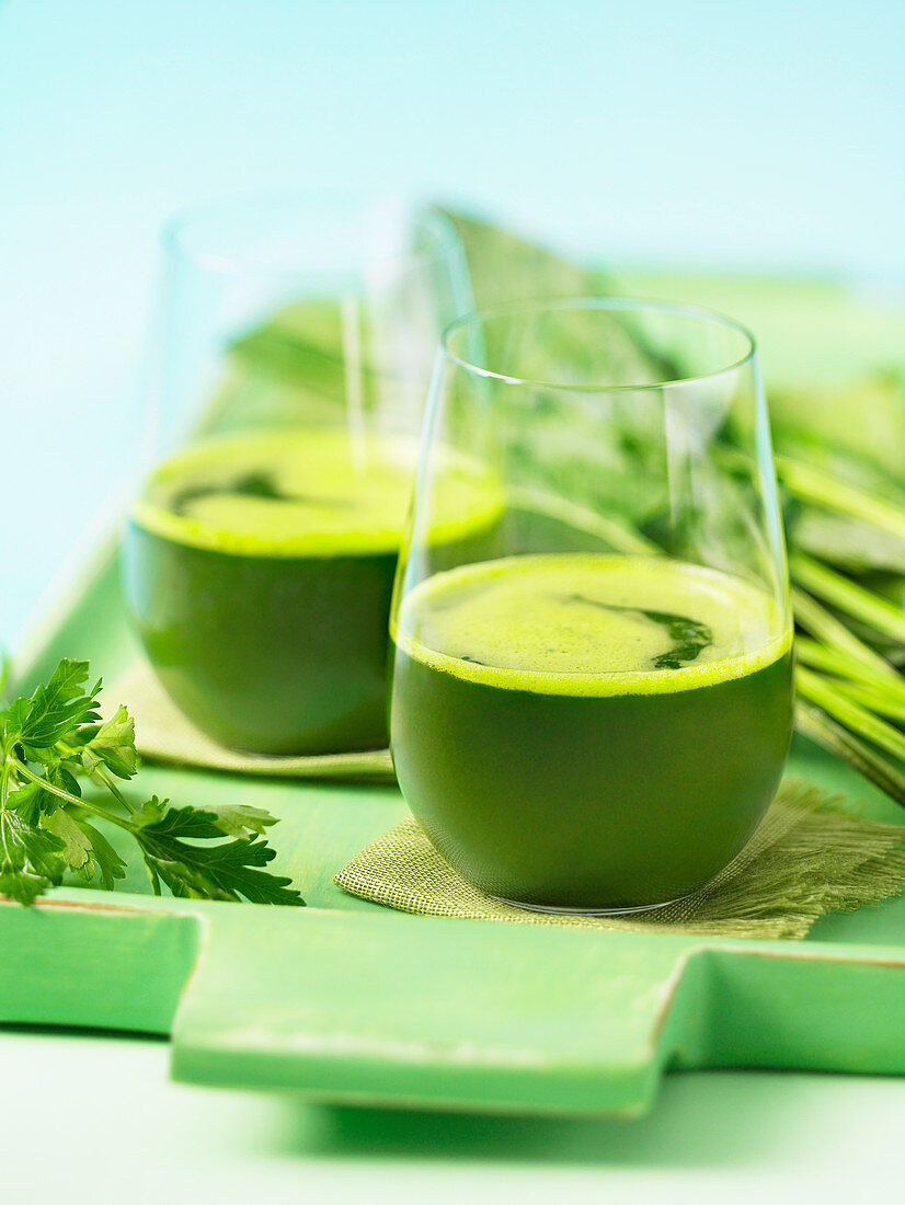 Glasses of parsley and spinach juice